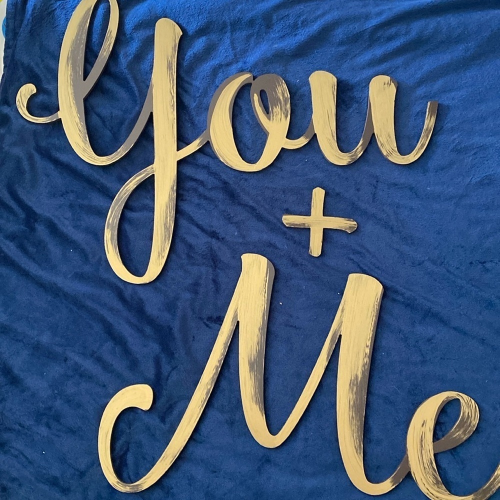Wooden wall words. You and Me